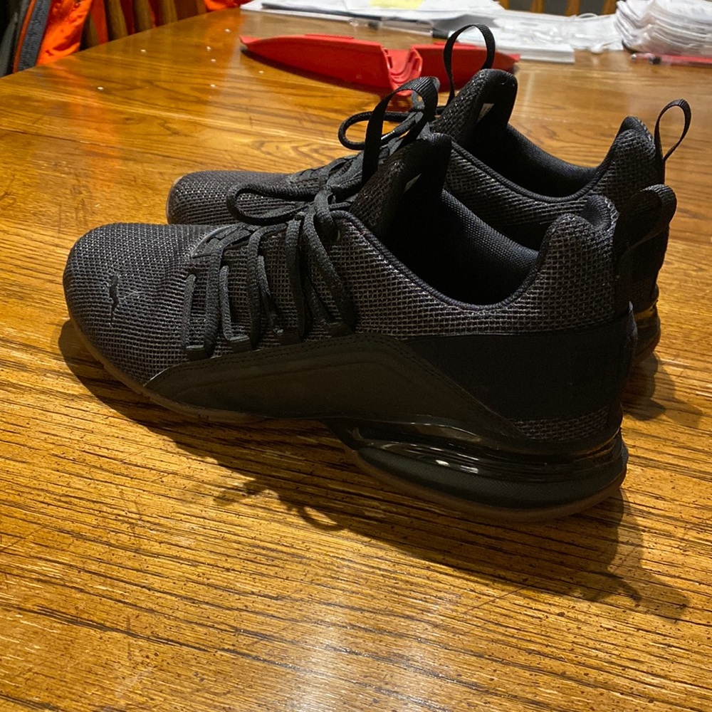Brand new size 11 Pumas. Worn once for about 2 hours